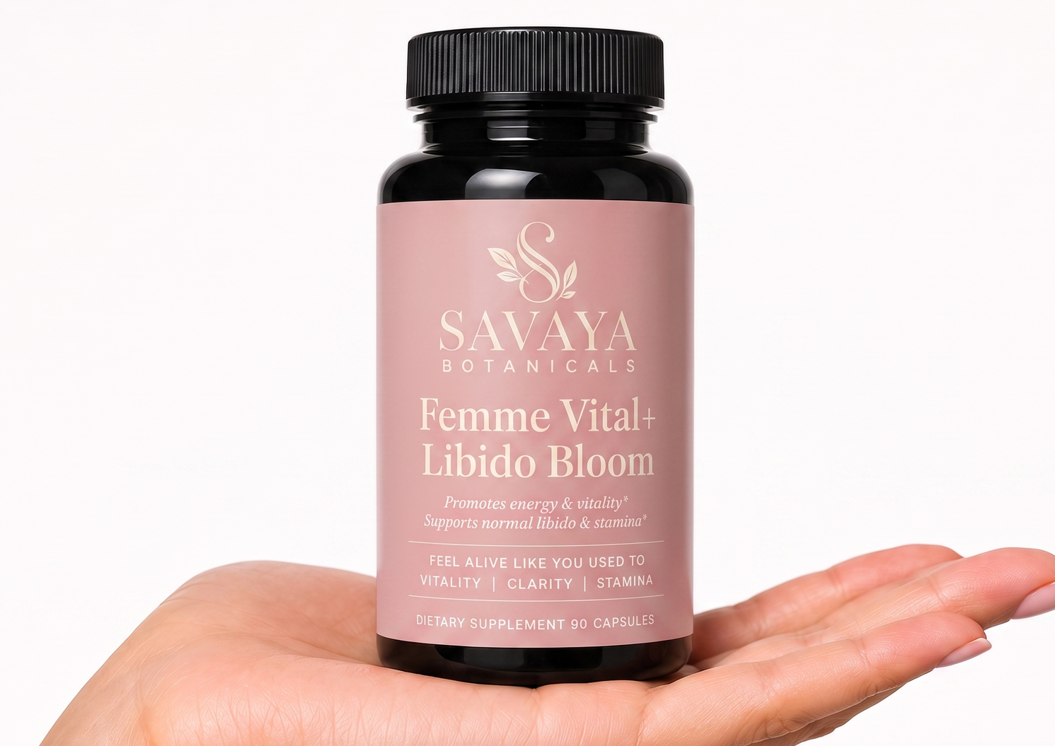 Femme Vital+ Libido Bloom resting on an open hand
