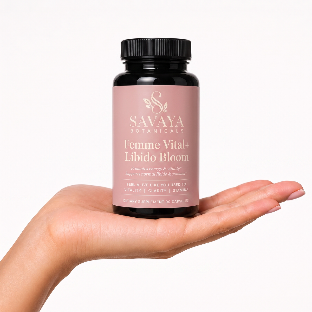 Femme Vital+ Libido Bloom bottle held in an open hand for scale