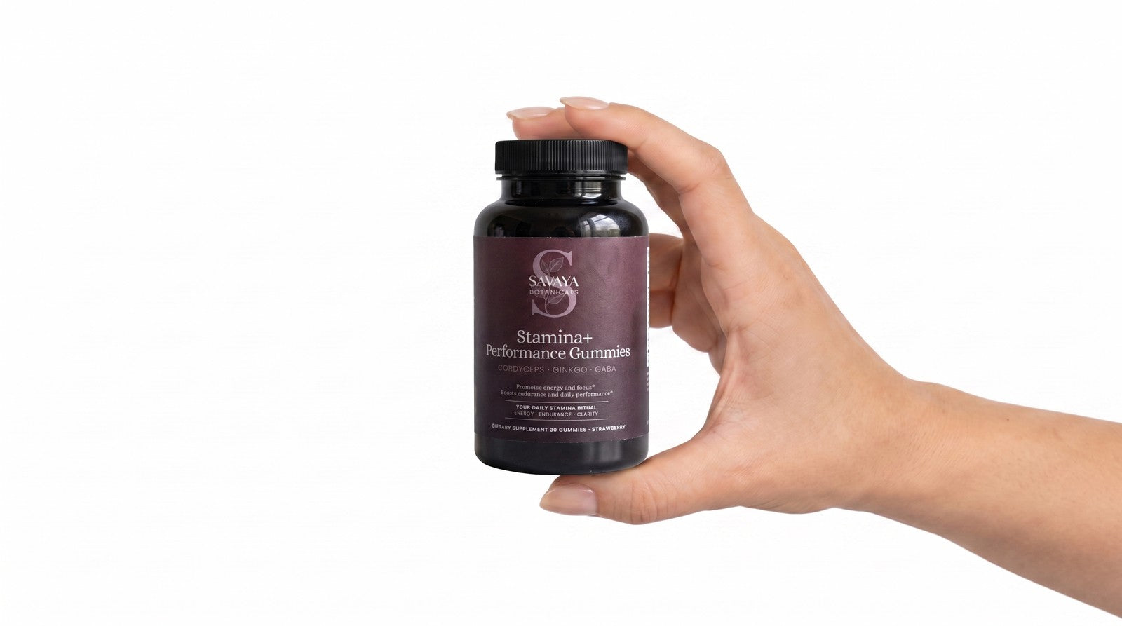 Performance+ Stamina Gummies™ resting on an open hand