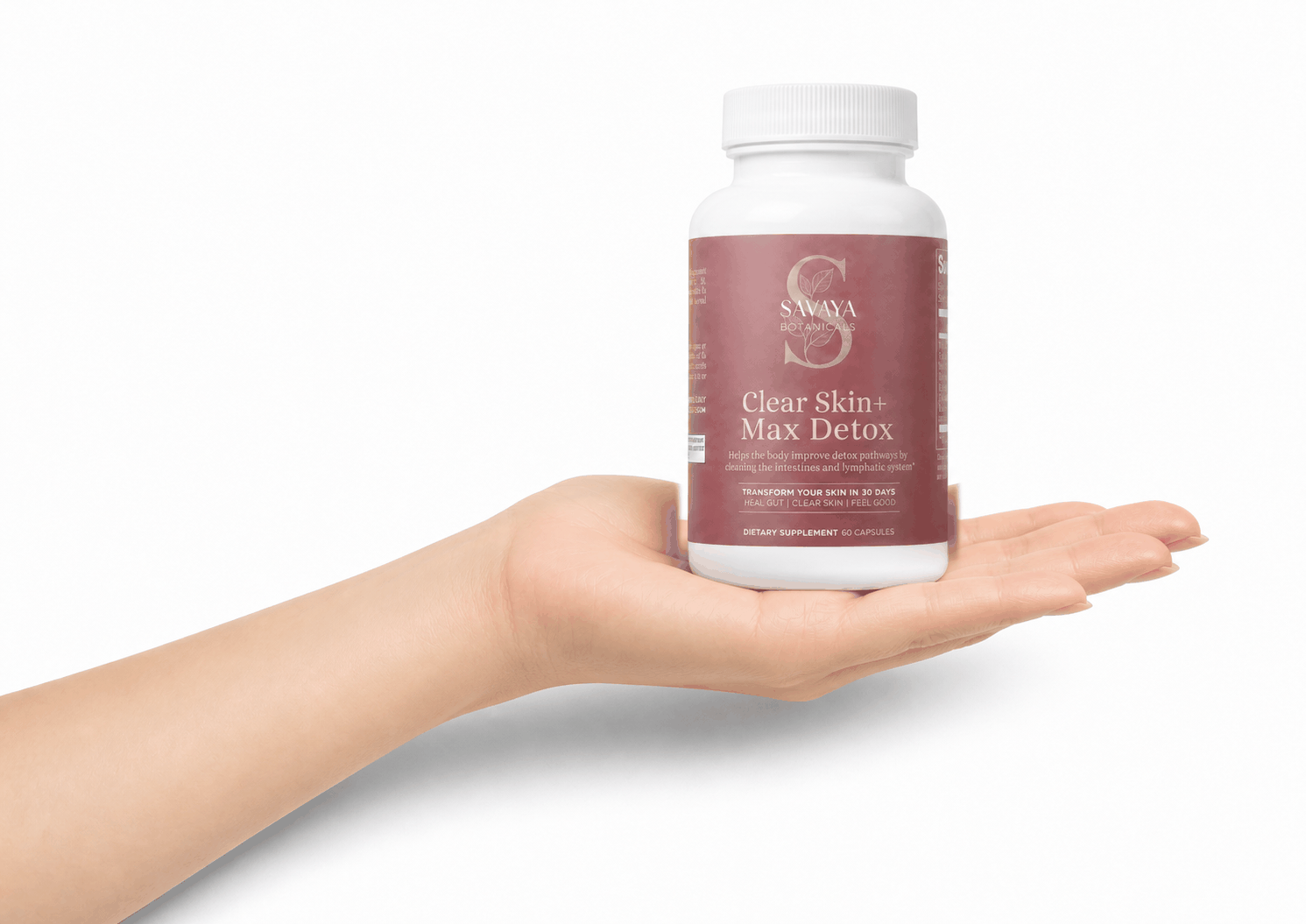 Savaya Clear Skin+ Max Detox resting on an open hand