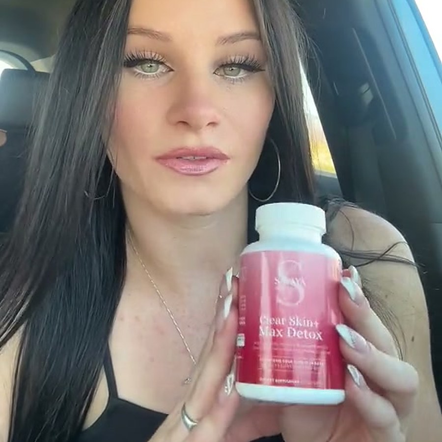 Customer holding Clear Skin+ Max Detox